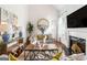 Stylish living room with modern furnishings, fireplace, and natural light from the window at 4729 Woodland Brook Se Ct, Atlanta, GA 30339