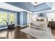 Spacious main bedroom suite features a trey ceiling, sitting area, and ensuite bathroom at 4729 Woodland Brook Se Ct, Atlanta, GA 30339