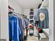 Walk-in closet with ample storage space, shelving and hanging racks to organize any wardrobe at 830 Bonnie Glen Se Dr, Marietta, GA 30067
