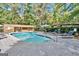 Community pool with clear water, lounge chairs, shaded area, and well-maintained surrounding at 830 Bonnie Glen Se Dr, Marietta, GA 30067