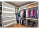 Custom closet design with built-in shelving and hanging rods for optimal organization at 2101 Thomas Rd, Canton, GA 30115