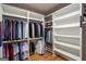 Spacious walk-in closet with ample shelving and hanging space for organized storage at 2101 Thomas Rd, Canton, GA 30115