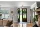 Welcoming entryway with hardwood floors, view to the outdoors, and barn door at 2101 Thomas Rd, Canton, GA 30115