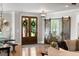 Entryway with wood doors, sliding barn door and bench seating at 2101 Thomas Rd, Canton, GA 30115