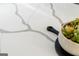 Close-up of a white kitchen island with light veining at 2101 Thomas Rd, Canton, GA 30115