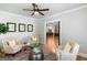 Inviting living room with seating, a decorative rug, and a view into the kitchen at 2101 Thomas Rd, Canton, GA 30115