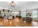 Expansive living area with a fireplace, seating, dining table and open floor plan at 2101 Thomas Rd, Canton, GA 30115