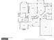 First floor plan featuring the primary bedroom, kitchen, living room, and garage at 3088 Hidden Falls Dr, Buford, GA 30519