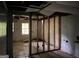 Basement requiring renovations, with exposed walls and ceiling at 372 Nalley Dr, Stone Mountain, GA 30087