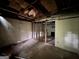 Basement view with exposed ceiling, showing room to add walls and rooms at 372 Nalley Dr, Stone Mountain, GA 30087