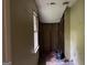 Bathroom with a window, tub, and evidence of remodeling or repair work at 372 Nalley Dr, Stone Mountain, GA 30087