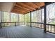 Wooden deck with string lights, overlooking a backyard with mature trees at 2689 Spring Rock Ne Ct, Roswell, GA 30075
