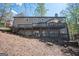 Rear of house with multi-level decks and outdoor entertaining space at 2689 Spring Rock Ne Ct, Roswell, GA 30075