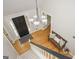 Bright foyer with hardwood floors, staircase, and modern lighting fixture at 2689 Spring Rock Ne Ct, Roswell, GA 30075