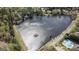 Scenic aerial view of lake featuring a gazebo and close proximity to the community pool at 2689 Spring Rock Ne Ct, Roswell, GA 30075