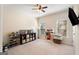 Vaulted bedroom featuring carpet, a ceiling fan, and two windows providing natural light at 2740 Greymont Ct, Cumming, GA 30041
