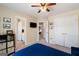 Another view of a bedroom with an ensuite bathroom and view of second bedroom down the hall at 2740 Greymont Ct, Cumming, GA 30041