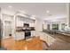 Bright kitchen featuring white cabinets, granite countertops, and stainless steel appliances at 2740 Greymont Ct, Cumming, GA 30041