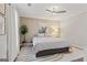 This bedroom features a ceiling fan, neutral decor, and lots of natural light at 4113 Ashford Green Dr, Duluth, GA 30096