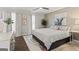 The main bedroom has a ceiling fan, natural light, and neutral decor at 4113 Ashford Green Dr, Duluth, GA 30096
