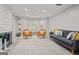 Bright living room featuring a fireplace, modern furnishings, and neutral decor at 4113 Ashford Green Dr, Duluth, GA 30096