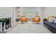 Bright living room featuring a fireplace, modern furnishings, and neutral decor at 4113 Ashford Green Dr, Duluth, GA 30096