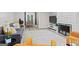 Open-concept living room showcasing a fireplace, and modern decor at 4113 Ashford Green Dr, Duluth, GA 30096