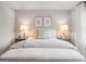 Bedroom with a luxurious bed, lamps, and elegant decor at 5615 Hislop Ln # 82, Mableton, GA 30126