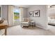 Cozy bedroom with a chair, side table, and neutral decor for a relaxing atmosphere at 5615 Hislop Ln # 82, Mableton, GA 30126