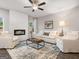 Comfortable living room with a fireplace, neutral tones, and stylish decor at 5615 Hislop Ln # 82, Mableton, GA 30126