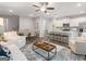 Spacious living room open to dining and kitchen, featuring modern finishes and ample natural light at 5615 Hislop Ln # 82, Mableton, GA 30126