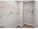 Simple walk-in closet with wire shelving for ample storage in the new home at 5615 Hislop Ln # 82, Mableton, GA 30126