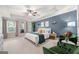 Spacious main bedroom with tray ceilings, ample natural light, and stylish decor at 774 Belrose Dr, Smyrna, GA 30080