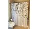 Shower in bathroom with floral shower curtain at 120 Chastain # 1803, Kennesaw, GA 30144