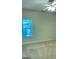 Bright bedroom featuring a ceiling fan and natural light from a window at 120 Chastain # 1803, Kennesaw, GA 30144