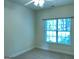 A vacant bedroom with neutral walls and carpet, ready for personalization at 120 Chastain # 1803, Kennesaw, GA 30144