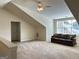 Large open living space with vaulted ceilings, bright windows, and comfortable seating at 120 Chastain # 1803, Kennesaw, GA 30144
