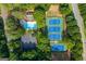 Community amenities featuring a pool, tennis courts, and parking area at 210 Hunters Vw, Roswell, GA 30075