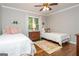 Cozy bedroom with white beds and a window providing ample natural light at 210 Hunters Vw, Roswell, GA 30075