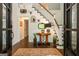 Elegant foyer with hardwood floors and a staircase at 210 Hunters Vw, Roswell, GA 30075