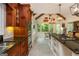 Gourmet kitchen with stainless steel appliances, granite countertops, and custom wood cabinetry at 210 Hunters Vw, Roswell, GA 30075