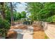 Outdoor community playground for children, nicely landscaped and surrounded by trees at 210 Hunters Vw, Roswell, GA 30075