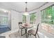Charming breakfast nook with a table, chairs, and a view of the outdoors through a window at 3 Maplelake Dr, Acworth, GA 30101