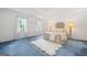 Spacious main bedroom featuring a trey ceiling, plush rug, and abundant natural light at 3 Maplelake Dr, Acworth, GA 30101
