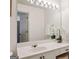 Bathroom featuring a large vanity with a large mirror and modern lighting at 1911 Stancrest Nw Trce, Kennesaw, GA 30152