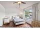 Bedroom featuring recessed lighting, hardwood floors, and a large window at 1911 Stancrest Nw Trce, Kennesaw, GA 30152