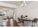 Bright dining area featuring modern light fixture and stylish velvet chairs at 1911 Stancrest Nw Trce, Kennesaw, GA 30152