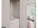 Convenient laundry room adjacent to the bedroom area at 1911 Stancrest Nw Trce, Kennesaw, GA 30152