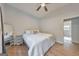 Cozy bedroom with a ceiling fan, comfortable bedding, and a calming atmosphere at 222 Bishop Ne Dr, Marietta, GA 30060