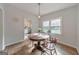 Charming dining room with hardwood floors and natural light, and access to kitchen at 222 Bishop Ne Dr, Marietta, GA 30060